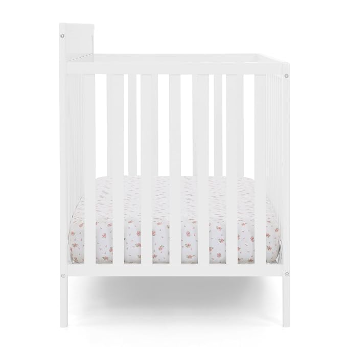 Delta Children Isabelle 6-in-1 Convertible Crib, Converts to Toddler Bed, Daybed, Sofa & Full Bed with/Without Footbaord, Greenguard Gold Certified, Mattress Heights, Bianca White