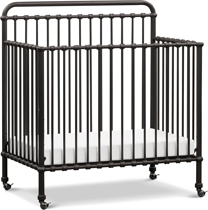 Namesake Winston 4-in-1 Convertible Mini Crib w/Wheels Durable Metal | GREENGUARD Gold Certified - Portable, Metal Baby Crib w/ Removable Wheels - Converts to Toddler Bed, Daybed & Twin Size Bed