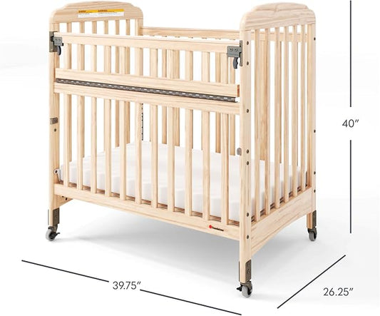 Foundations Serenity SafeReach Slatted Crib with Adjustable Mattress Board, Compact Wooden Baby Crib with Commercial Grade Casters, Includes 3” Foam Mattress (Natural)