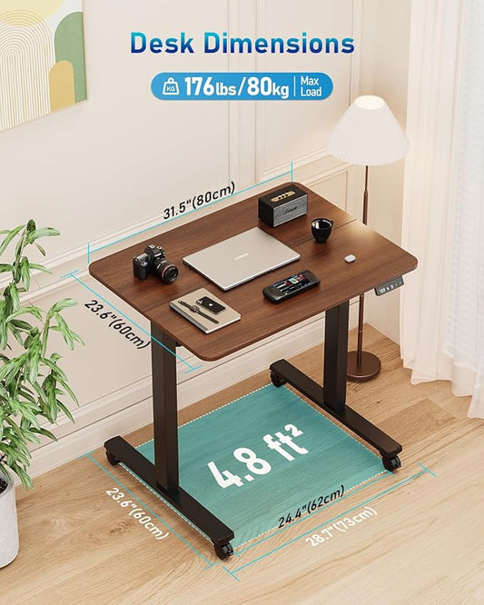32" Small Electric Rolling Standing Desk Adjustable Height, Mobile Sit Stand up Desk with Lockable Casters for Home Office & Computer Workstation, Splice Board, 2 Hooks, Black Frame/Walnut Top