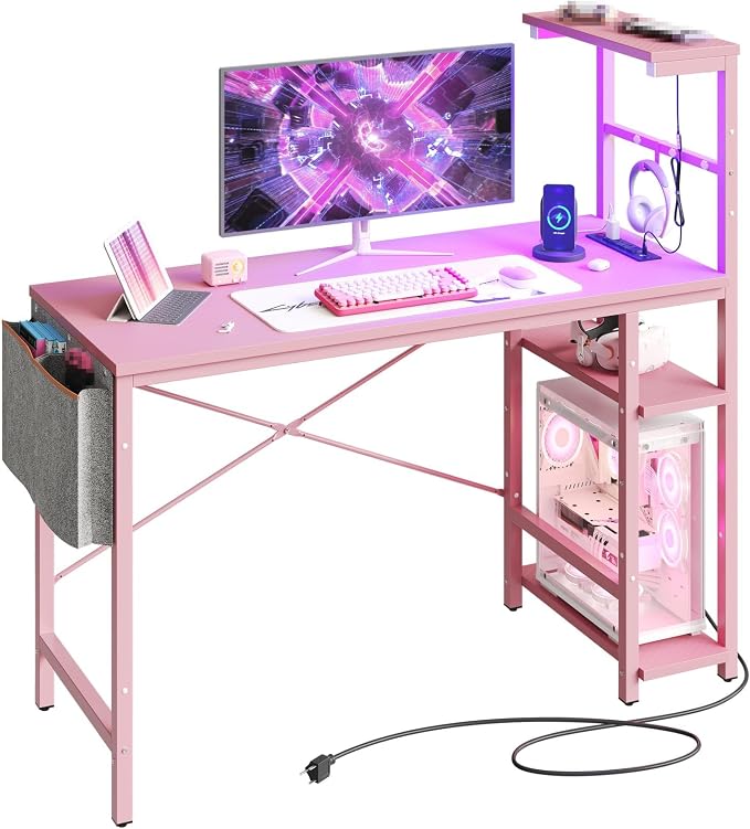 Bestier Pink Gaming Desk with Power Outlets, 44 Inch Led Gamer Desk with 4 Tiers Reversible Shelves, Computer Desk with Headset Hook & Side Storage Bag for Bedroom (Pink 3D Carbon Fiber)