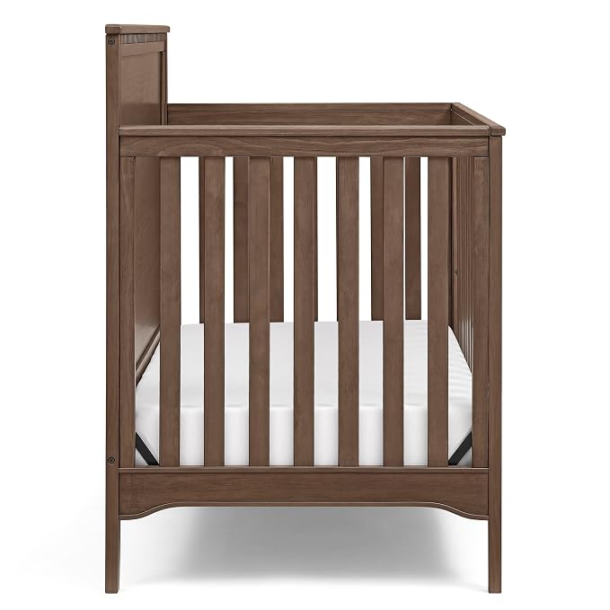 Delta Children Kendall 6-in1 Convertible Crib - Converts from Baby Crib to Toddler Bed, Daybed, Sofa Bed and Full-Size Bed with and Without Footboard, Fits Full-Size Crib Mattress, Teak Brown