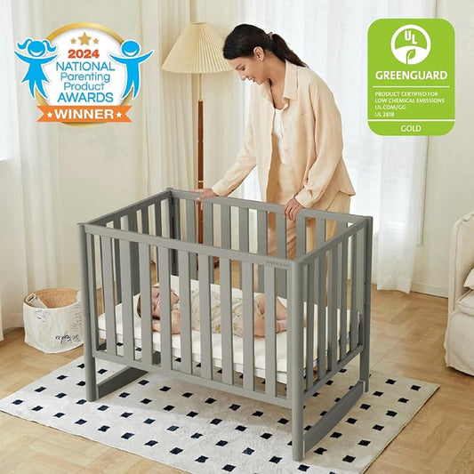 MAMAZING EvoNest 7-in-1 Convertible Baby Mini Crib with Wheels | GREENGUARD Gold Certified, New Zealand Pine Wood, 4 Adjustable Heights, Rocking Mode, Small Spaces Design, Grey