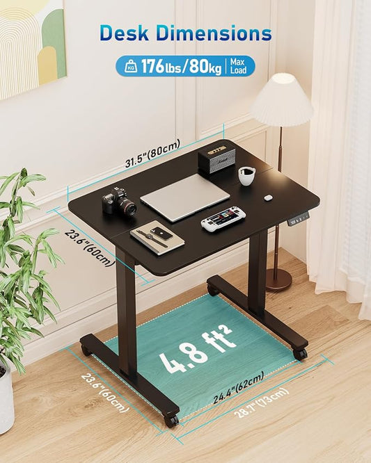 32" Small Electric Rolling Standing Desk Adjustable Height, Mobile Sit Stand up Desk with Lockable Casters for Home Office & Computer Workstation, Splice Board, 2 Hooks, Black Frame/Black Top