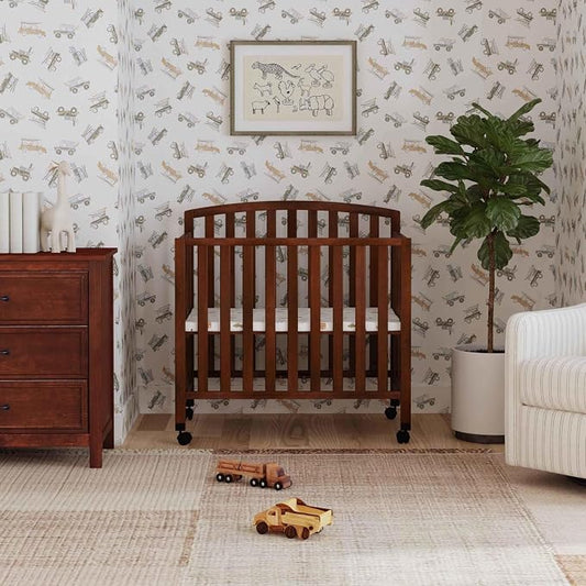 Davinci Dylan 3-in-1 Convertible Portable Mini Crib, Espresso | GREENGUARD Gold Certified - Folding Baby Crib With Wheels, 4 Adjustable Mattress Heights, Conversion Kit Sold Separately