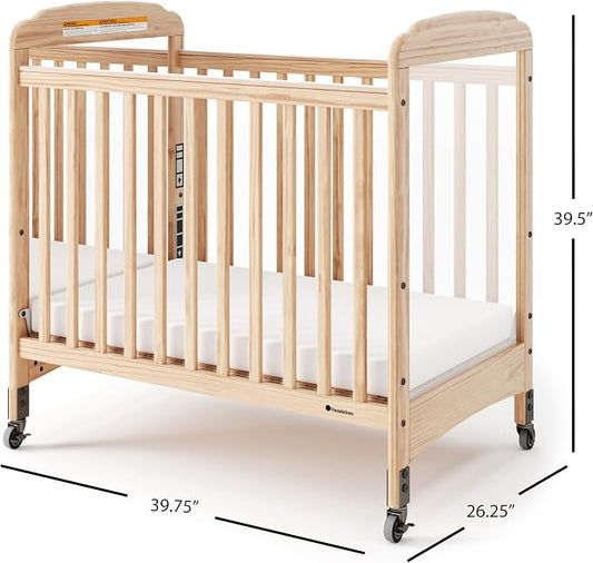 Foundations Serenity Compact Mirrorview Daycare Crib, Fixed Side, Features Mirrorview End Panels and Slatted Side Panels, Durable Wood Construction, Includes 3” InfaPure Foam Mattress (Natural)