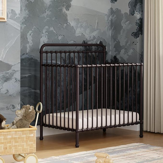 Namesake Winston 4-in-1 Convertible Mini Crib w/Wheels Durable Metal | GREENGUARD Gold Certified - Portable, Metal Baby Crib w/ Removable Wheels - Converts to Toddler Bed, Daybed & Twin Size Bed