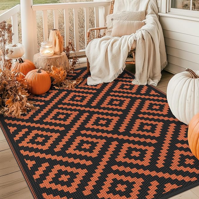 GENIMO Outdoor Rug for Patio, 6'x9' Fall Reversible Plastic Straw Rugs, Waterproof Halloween RV Camping Mat Lightweight Carpet for Camper, Balcony, Deck, Backyard, Picnic, Black Orange