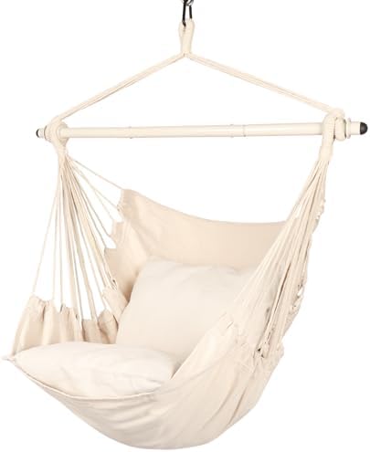 Cream-colored fabric hanging hammock chair with a wooden support bar and hanging ropes, shown against a plain white background.