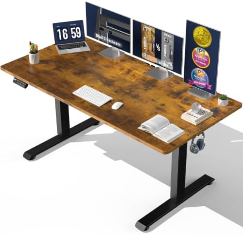 A modern adjustable height standing desk with a brown wood-grain top and black metal legs, shown with various desk accessories and three computer monitors on a white background.