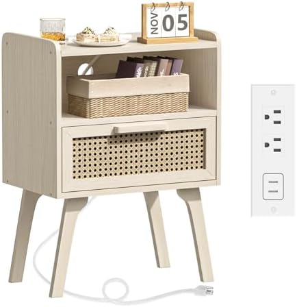 A light beige wood nightstand with a single drawer featuring a woven cane front, shown with decorative items on top and a power outlet adapter graphic on the right side.
