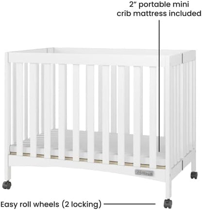 Child Craft London Mini Compact Folding Portable Crib with 2” Crib Mattress and 2 Easy Roll Locking Wheels, Durable Pine Wood Construction (Matte White)