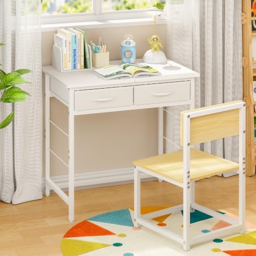 White children's desk with two drawers and a matching white chair with a light wood seat and back, shown in a bright room with curtains, books, and a colorful rug.
