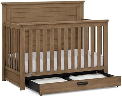 Delta Children Simmons Kids Caden 6-in-1 Convertible Crib with Trundle Drawer, Greenguard Gold Certified, Aged Oak