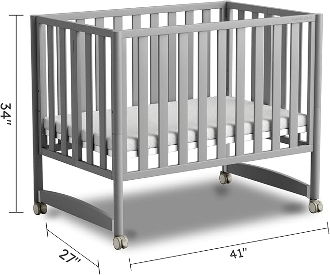 MAMAZING EvoNest 7-in-1 Convertible Baby Mini Crib with Wheels | GREENGUARD Gold Certified, New Zealand Pine Wood, 4 Adjustable Heights, Rocking Mode, Small Spaces Design, Grey