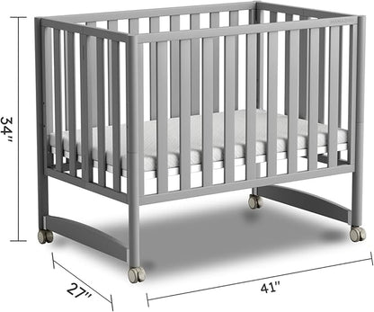 MAMAZING EvoNest 7-in-1 Convertible Baby Mini Crib with Wheels | GREENGUARD Gold Certified, New Zealand Pine Wood, 4 Adjustable Heights, Rocking Mode, Small Spaces Design, Grey