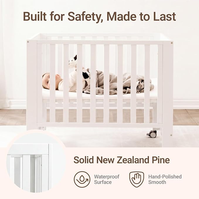 MAMAZING EvoNest 6-in-1 Convertible Baby Mini Crib with Wheels, GREENGUARD Gold Certified, 4 Adjustable Mattress Heights, 100% New Zealand Pine Wood, Portable Woodern Crib for Small Spaces, White
