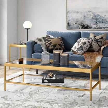 Henn&Hart 54" Wide Rectangular Coffee Table in Brass, Modern coffee tables for living room, studio apartment essentials | Open lower shelf adds practical storage while the glass design keeps spaces feeling bright