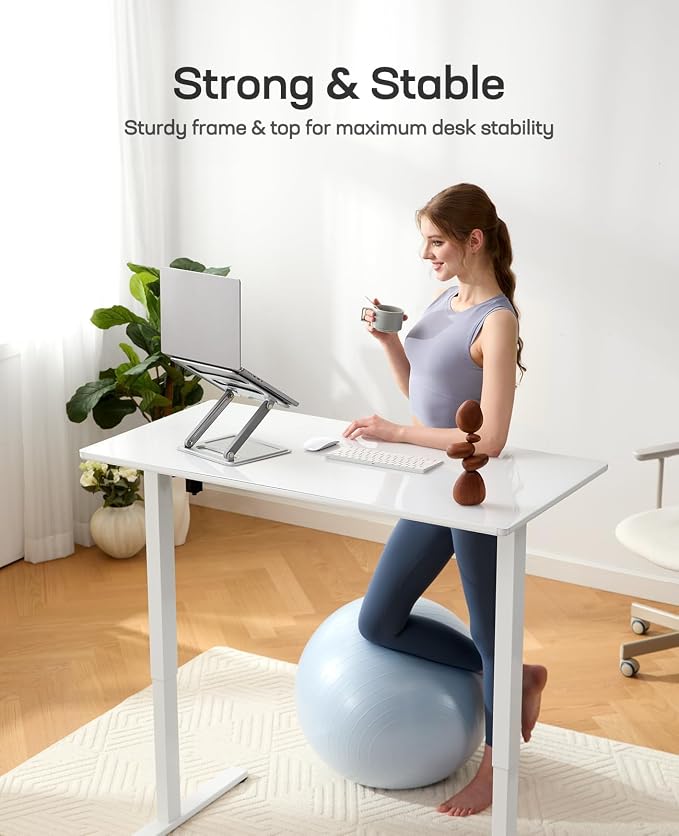 Marsail Glass Standing Desk with Drawer, 55 x 28 Inches Adjustable Desk, Home Office Desks with One-Piece Tempered Glass Top, Ergonomic Home Office Sit Stand Desk with 4 Preset Heights, White