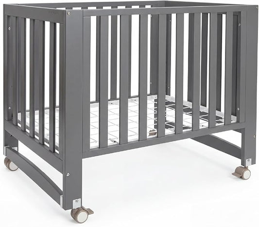 MAMAZING EvoNest 6-in-1 Convertible Baby Mini Crib with Wheels | GREENGUARD Gold Certified, New Zealand Pine Wood, 4 Adjustable Heights, Rocking Mode, Small Spaces Design, Grey