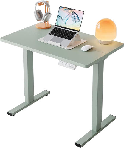 HUANUO 32x19 Inch Small Electric Standing Desk, Adjustable, Sage Green | Compact Home Office Desk, 176lbs heavy duty lifting with 4 height presets. M8 screw holes ready for DIY mobile wheels