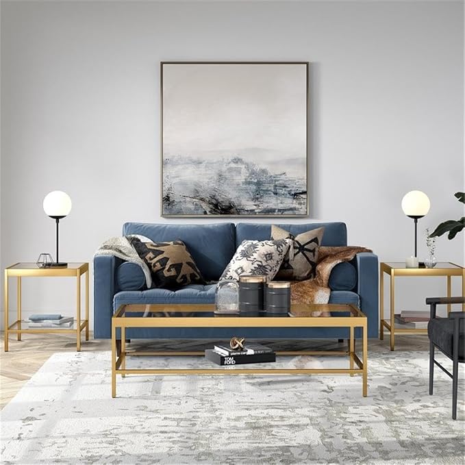 Henn&Hart 54" Wide Rectangular Coffee Table in Brass, Modern coffee tables for living room, studio apartment essentials | Open lower shelf adds practical storage while the glass design keeps spaces feeling bright