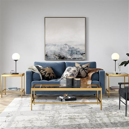 Henn&Hart 54" Wide Rectangular Coffee Table in Brass, Modern coffee tables for living room, studio apartment essentials | Open lower shelf adds practical storage while the glass design keeps spaces feeling bright