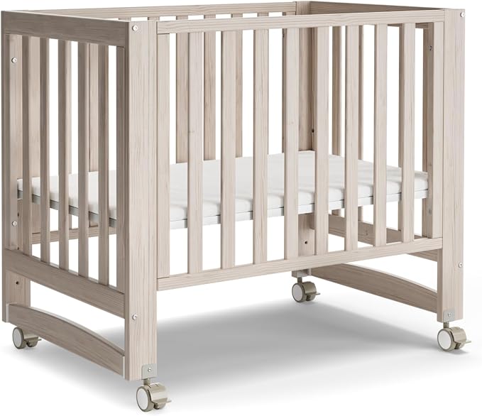 MAMAZING EvoNest 6-in-1 Convertible Baby Mini Crib with Wheels | GREENGUARD Gold Certified, New Zealand Pine Wood, 4 Adjustable Heights, Rocking Mode, Small Spaces Design, Washed Natural