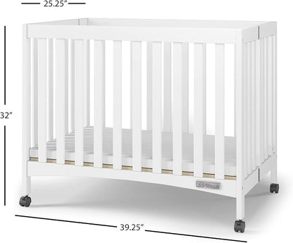 Child Craft London Mini Compact Folding Portable Crib with 2” Crib Mattress and 2 Easy Roll Locking Wheels, Durable Pine Wood Construction (Matte White)