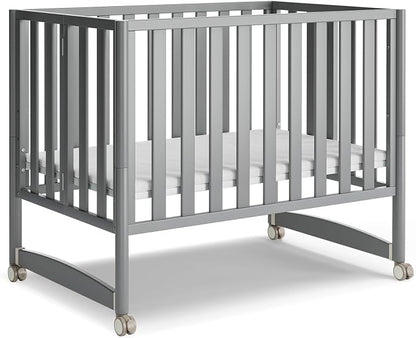 MAMAZING EvoNest 7-in-1 Convertible Baby Mini Crib with Wheels | GREENGUARD Gold Certified, New Zealand Pine Wood, 4 Adjustable Heights, Rocking Mode, Small Spaces Design, Grey