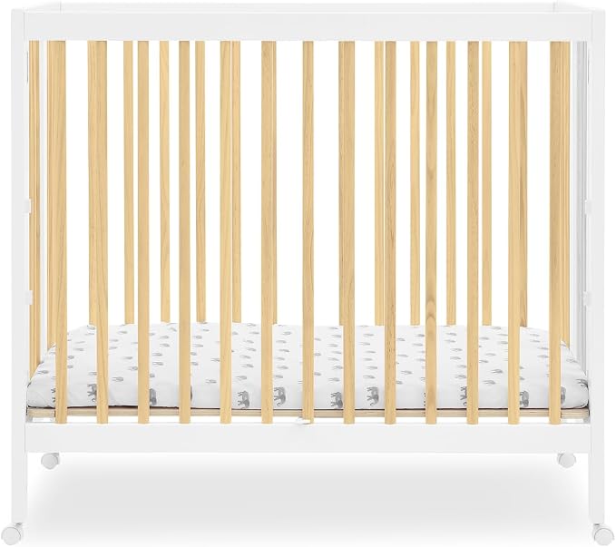 Delta Children Mia Portable Folding Mini Crib with 1.5-Inch Mattress - Greenguard Gold Certified, Bianca White/Natural