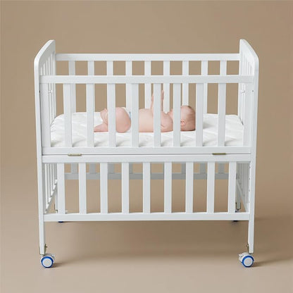 Flwrgirl Convertible Mini Baby Crib - Portable Bedside Bassinet with Mattress Included,3 Heights Baby Crib with Wheels for Small Room and Newborns 0-12 Months,White