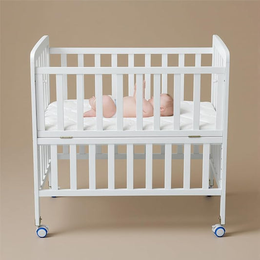 Flwrgirl Convertible Mini Baby Crib - Portable Bedside Bassinet with Mattress Included,3 Heights Baby Crib with Wheels for Small Room and Newborns 0-12 Months,White
