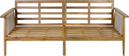 A wooden outdoor daybed with a slatted backrest and seat, featuring woven cane side panels, shown against a plain white background.