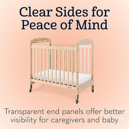 Foundations Serenity Compact Mirrorview Daycare Crib, Fixed Side, Features Mirrorview End Panels and Slatted Side Panels, Durable Wood Construction, Includes 3” InfaPure Foam Mattress (Natural)