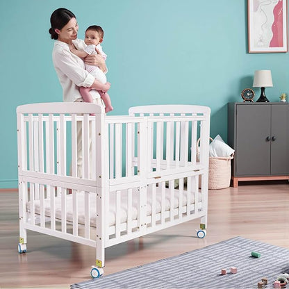 Flwrgirl Mini Baby Crib with Mattress,Portable Bedside Sleeper & Bassinet,5 Adjustable Heights,Wood Nursery Crib with Locking Wheels,Compact Baby Bed for Newborns & Infants,White