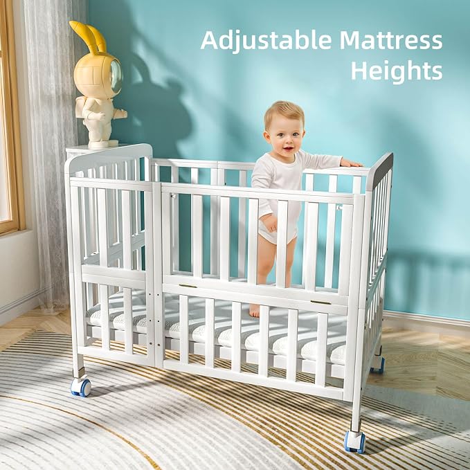 Flwrgirl Mini Baby Crib with Mattress,Portable Bedside Sleeper & Bassinet,5 Adjustable Heights,Wood Nursery Crib with Locking Wheels,Compact Baby Bed for Newborns & Infants,White
