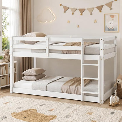 Twin Over Twin Bunk Bed, Low Profile Wooden Frame for Kids Bedroom, Floor Bunk with Ladder and Guardrails, Rubber Wood Construction, 13 Plywood Slats, No Box Spring Needed (White)