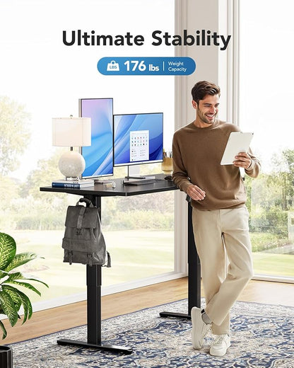 HUANUO Electric Standing Desks, Whole Piece Desktop, Adjustable Height Computer Desk, 4 Height Memory Settings, Sit Stand Up Desk for Home Office, 60" x 24", Black