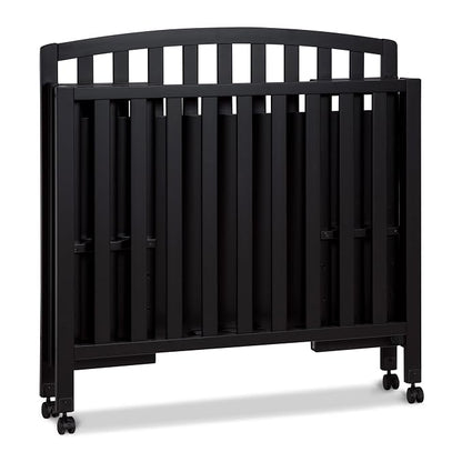 Davinci Dylan 3-in-1 Convertible Portable Mini Crib, Ebony | GREENGUARD Gold Certified - Folding Baby Crib With Wheels, 4 Adjustable Mattress Heights, Conversion Kit Sold Separately