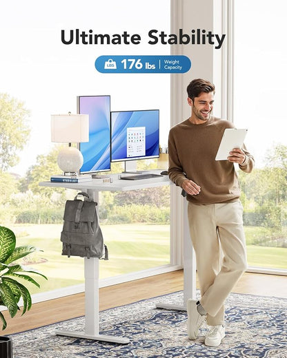 HUANUO Electric Standing Desk, Whole Piece Desktop, Adjustable Height Computer Desk, 4 Height Memory Settings, Sit Stand Up Desk for Home Office, 60" x 24", White