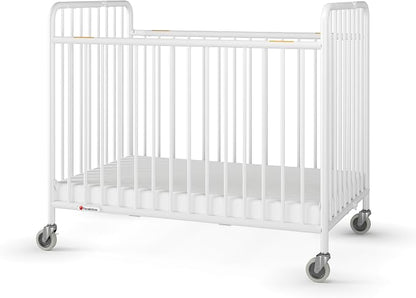 Foundations Stowaway Metal Baby & Toddler Folding Crib, Portable Baby Crib with Foam Mattress and Commercial Grade 3" Casters, Compact for Hotels, White
