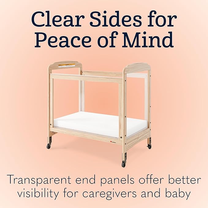 Foundations Serenity Compact 4 Side Clearview Daycare Crib Natural, Fixed Side, Durable Wood Construction, Non-Marking Casters (2 Locking), Includes 3” InfaPure Foam Mattress