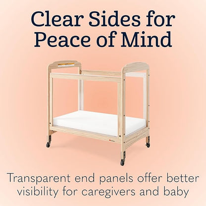 Foundations Serenity Compact 4 Side Clearview Daycare Crib Natural, Fixed Side, Durable Wood Construction, Non-Marking Casters (2 Locking), Includes 3” InfaPure Foam Mattress
