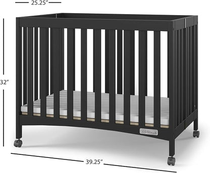 Child Craft London Mini Compact Folding Portable Crib with 2” Crib Mattress and 2 Easy Roll Locking Wheels, Durable Pine Wood Construction (Ebony Black)