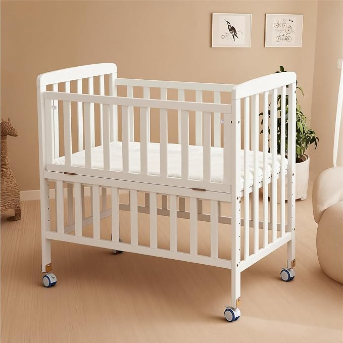 Flwrgirl Convertible Mini Baby Crib - Portable Bedside Bassinet with Mattress Included,3 Heights Baby Crib with Wheels for Small Room and Newborns 0-12 Months,White