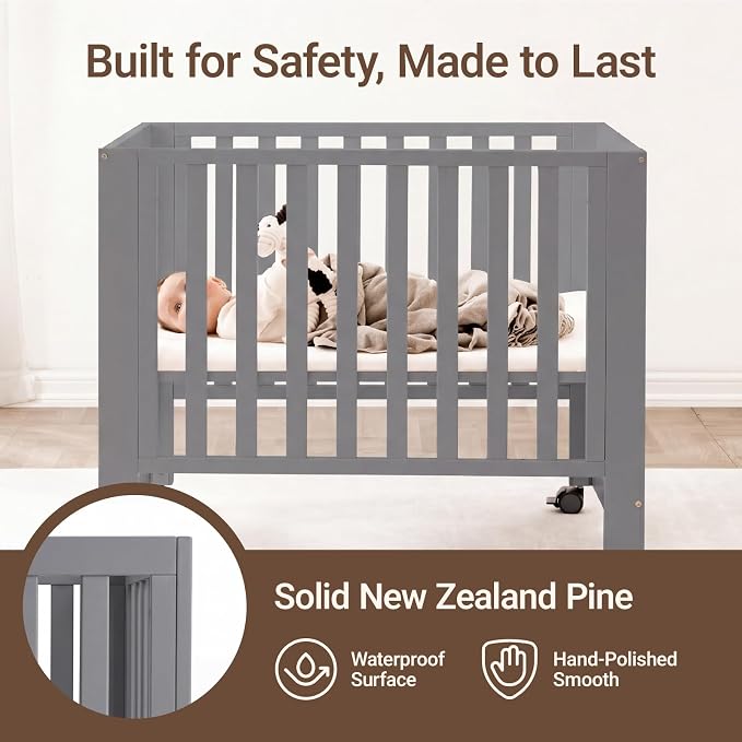 MAMAZING EvoNest 6-in-1 Convertible Baby Mini Crib with Wheels | GREENGUARD Gold Certified, New Zealand Pine Wood, 4 Adjustable Heights, Rocking Mode, Small Spaces Design, Grey