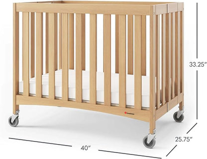 Foundations Travel Sleeper Wood Compact Folding Crib with 2” InfaPure Foam Crib Mattress and Commercial Grade Casters for Hotels, Natural