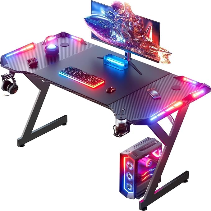 HLDIRECT 55 Inch Gaming Desk with LED Lights, Ergonomic Computer Gaming Table with Carbon Fibre Surface, Sturdy PC Workstation Desk for Home Office with Headphone Hook, Cup Holder, Black