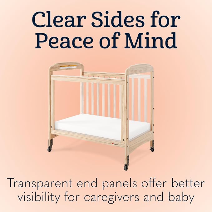 Foundations Serenity Compact 3 Side Clearview Daycare Crib Natural, Fixed Side, Durable Wood Construction, Non-Marking Casters (2 Locking), Includes 3” InfaPure Foam Mattress